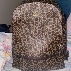 Calvin Klein Monogram Logo Large Women’s Backpack Gold Brown Leather